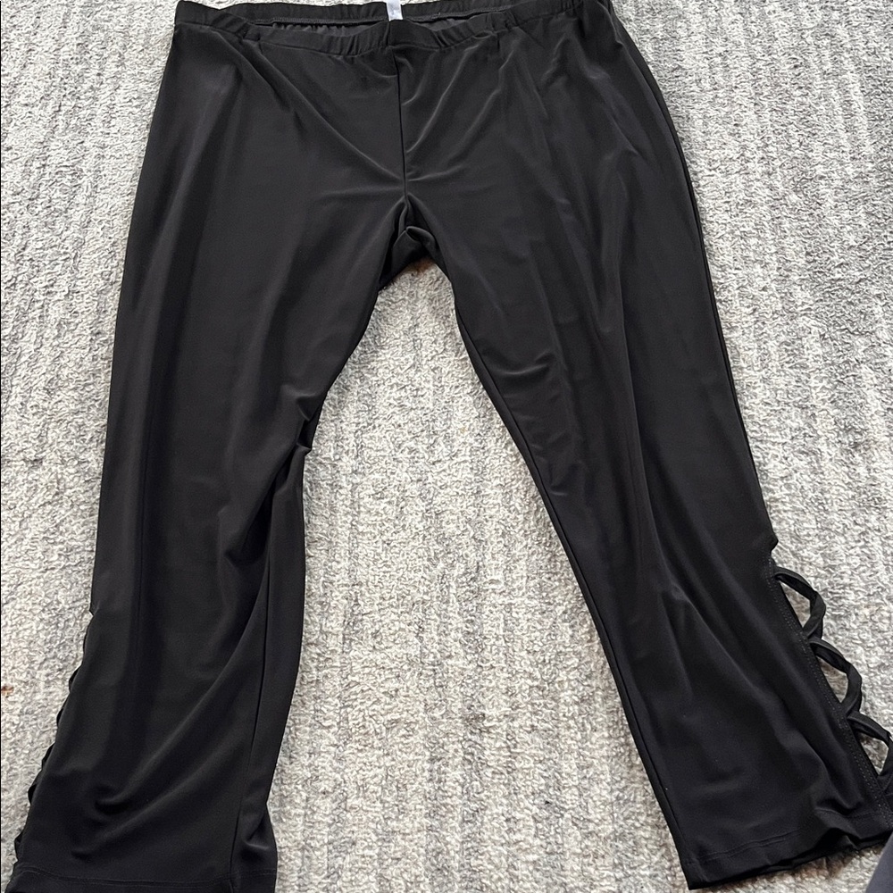 Black Women's Leggings with Side Cutout Detail and metal accents. Size 1x